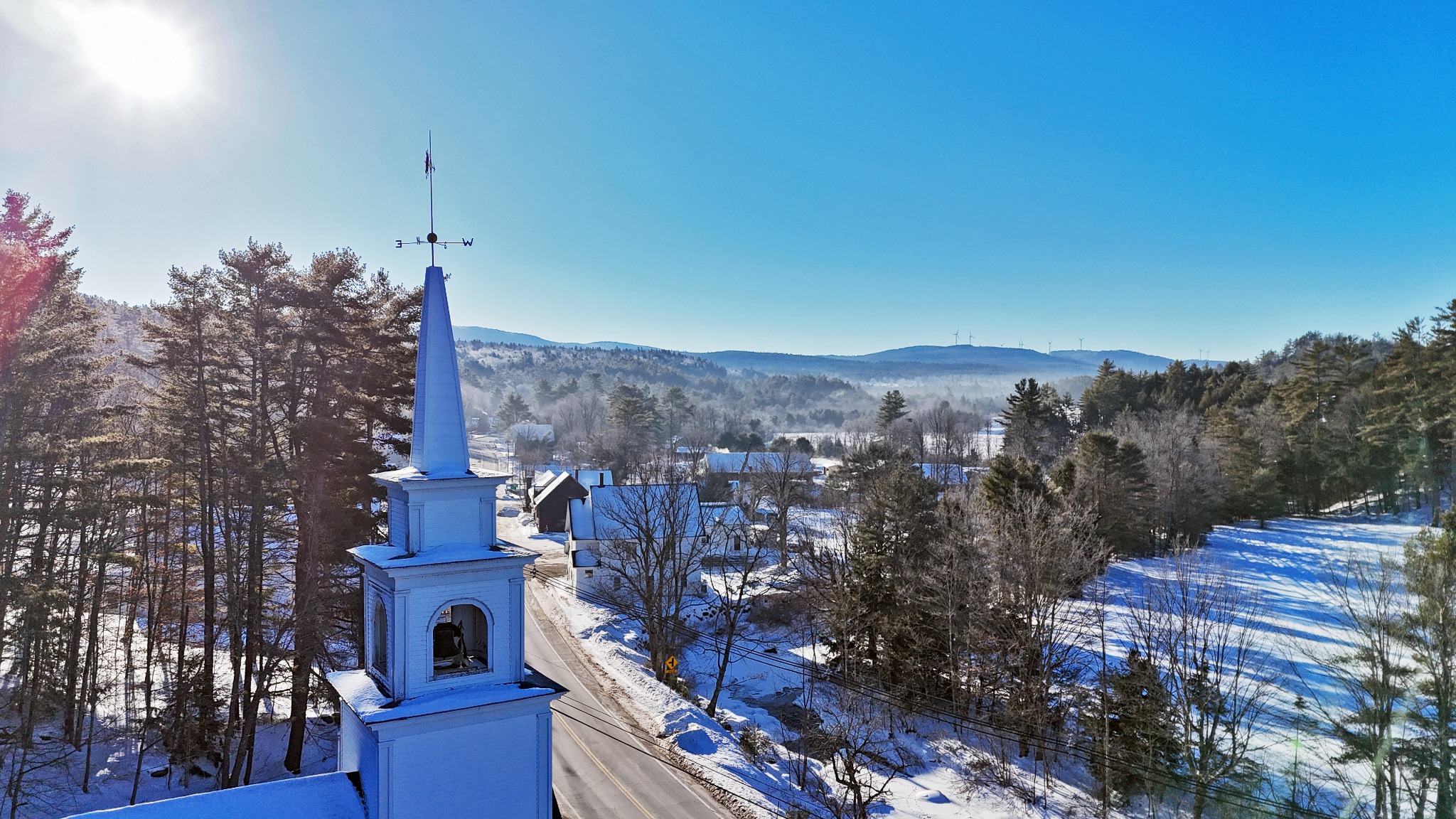 Goshen New Hampshire church steeple and winter landscape from above
